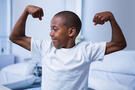 Im Giving Brainliest :DWhich Of The Following Best Describes How The Boy Is Able To Flex His Muscles?As