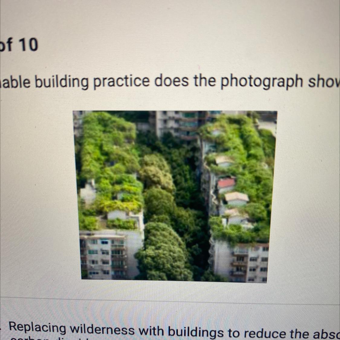 Which Sustainable Building Practice Does The Photograph Show?A. Replacing Wilderness With Buildings To
